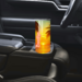 Tumbler snug in car cupholder during a sunny road trip
